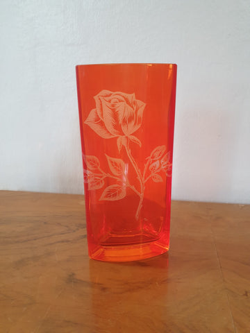 Vase en verre orange à motif de rose