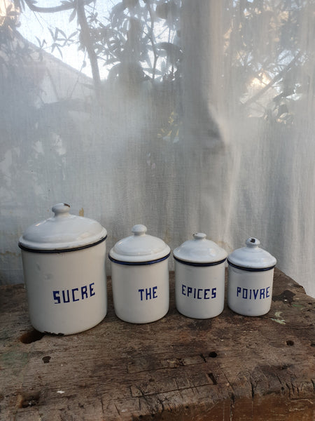 Série de 4 pots à épices anciens en tôle émaillée